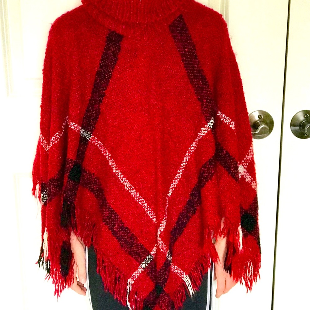 Red sweater poncho with fringe